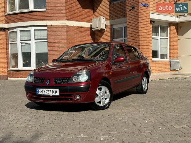 Красный Рено Clio Symbol, объемом двигателя 1.4 л и пробегом 421 тыс. км за 2777 $, фото 4 на Automoto.ua