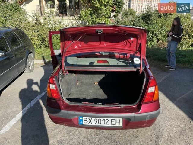 Красный Рено Clio Symbol, объемом двигателя 1.4 л и пробегом 281 тыс. км за 2650 $, фото 26 на Automoto.ua