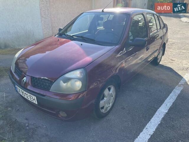 Красный Рено Clio Symbol, объемом двигателя 1.4 л и пробегом 281 тыс. км за 2650 $, фото 1 на Automoto.ua