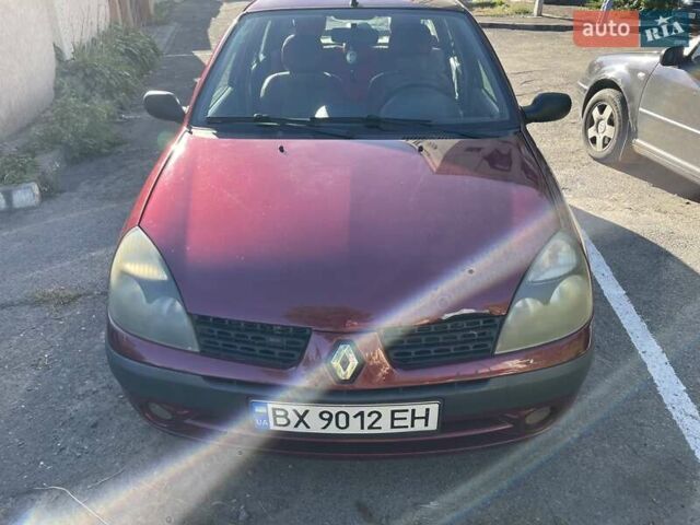 Красный Рено Clio Symbol, объемом двигателя 1.4 л и пробегом 281 тыс. км за 2650 $, фото 12 на Automoto.ua