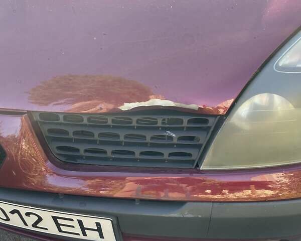 Красный Рено Clio Symbol, объемом двигателя 1.4 л и пробегом 281 тыс. км за 2650 $, фото 17 на Automoto.ua