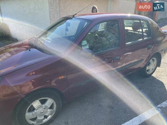 Красный Рено Clio Symbol, объемом двигателя 1.4 л и пробегом 281 тыс. км за 2650 $, фото 4 на Automoto.ua