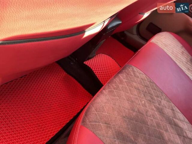 Красный Рено Clio Symbol, объемом двигателя 1.4 л и пробегом 281 тыс. км за 2650 $, фото 28 на Automoto.ua