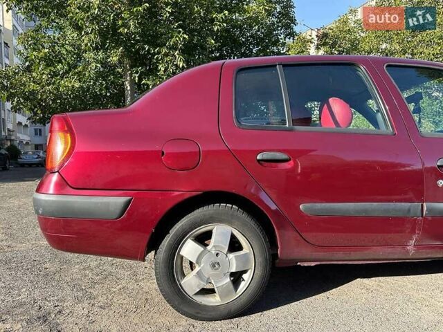 Красный Рено Clio Symbol, объемом двигателя 1.4 л и пробегом 281 тыс. км за 2650 $, фото 7 на Automoto.ua