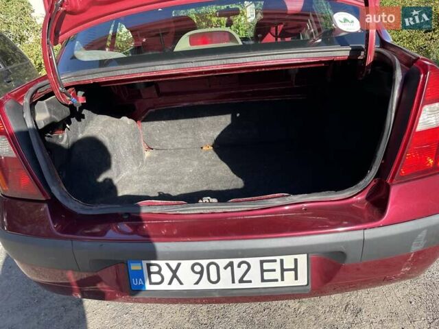 Красный Рено Clio Symbol, объемом двигателя 1.4 л и пробегом 281 тыс. км за 2650 $, фото 25 на Automoto.ua