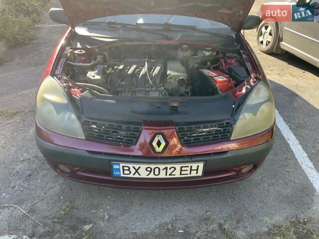 Красный Рено Clio Symbol, объемом двигателя 1.4 л и пробегом 281 тыс. км за 2650 $, фото 16 на Automoto.ua