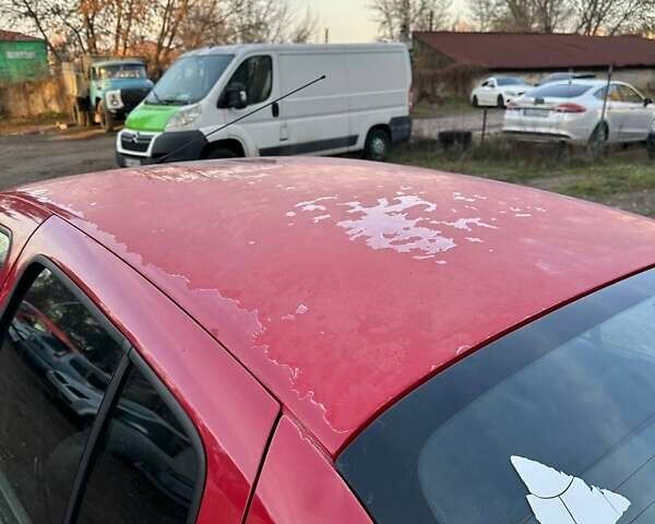 Красный Рено Clio Symbol, объемом двигателя 1.39 л и пробегом 259 тыс. км за 1799 $, фото 9 на Automoto.ua