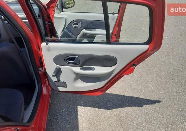 Красный Рено Clio Symbol, объемом двигателя 1.4 л и пробегом 138 тыс. км за 3600 $, фото 17 на Automoto.ua
