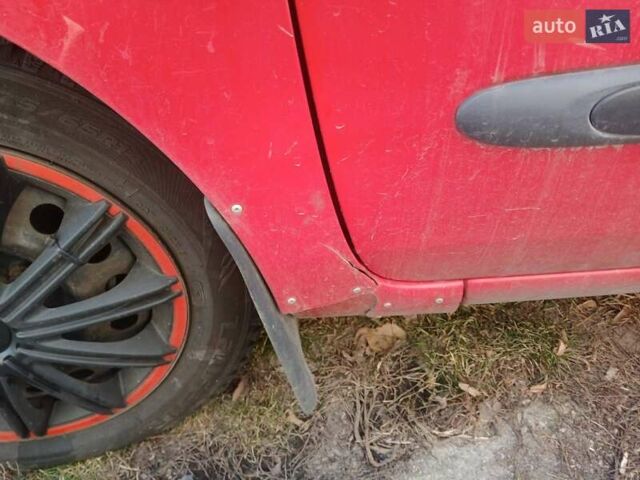 Красный Рено Clio Symbol, объемом двигателя 1.4 л и пробегом 320 тыс. км за 2800 $, фото 4 на Automoto.ua