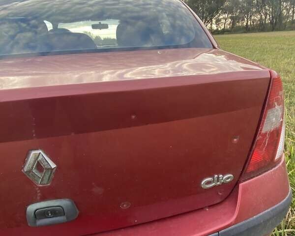 Красный Рено Clio Symbol, объемом двигателя 1.4 л и пробегом 174 тыс. км за 3100 $, фото 11 на Automoto.ua