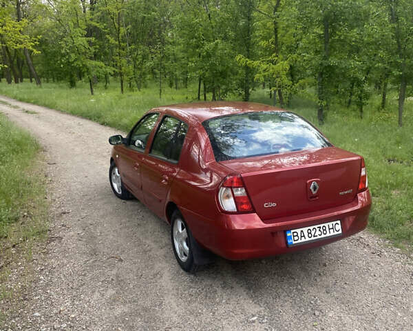 Красный Рено Clio Symbol, объемом двигателя 1.4 л и пробегом 136 тыс. км за 4800 $, фото 5 на Automoto.ua