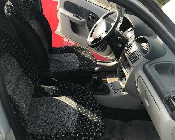 Серый Рено Clio Symbol, объемом двигателя 1.4 л и пробегом 144 тыс. км за 3000 $, фото 14 на Automoto.ua