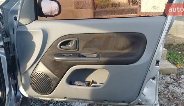 Серый Рено Clio Symbol, объемом двигателя 1.39 л и пробегом 338 тыс. км за 2600 $, фото 8 на Automoto.ua