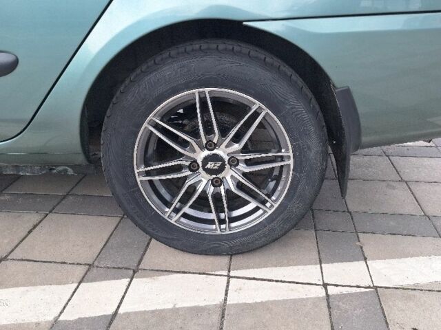 Зеленый Рено Clio Symbol, объемом двигателя 1.4 л и пробегом 165 тыс. км за 4000 $, фото 12 на Automoto.ua