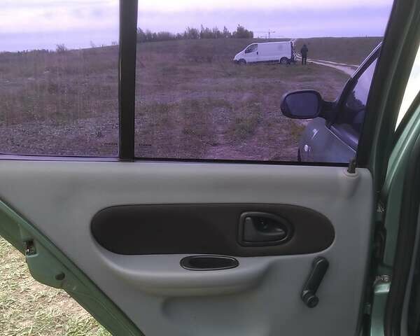 Зеленый Рено Clio Symbol, объемом двигателя 1.4 л и пробегом 267 тыс. км за 2200 $, фото 57 на Automoto.ua