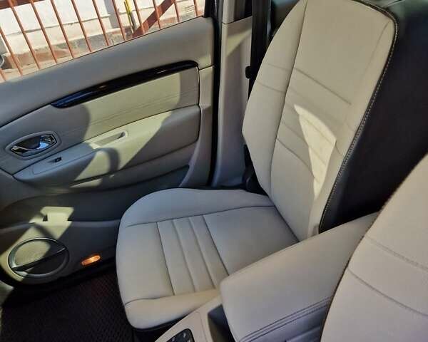 Черный Рено Megane Scenic, объемом двигателя 1.5 л и пробегом 164 тыс. км за 9100 $, фото 10 на Automoto.ua