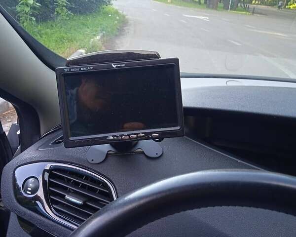 Серый Рено Megane Scenic, объемом двигателя 1.5 л и пробегом 180 тыс. км за 10300 $, фото 17 на Automoto.ua