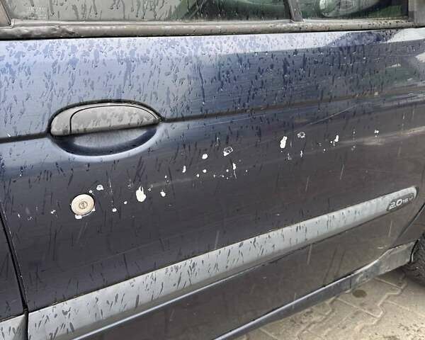 Рено Megane Scenic 2000 в Львове на Automoto.ua Синий Рено Megane Scenic, объемом двигателя 2 л и пробегом 305 тыс. км за 2600 $, фото 9 на Automoto.ua