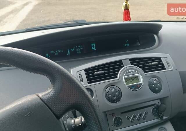 Синий Рено Megane Scenic, объемом двигателя 1.87 л и пробегом 354 тыс. км за 5600 $, фото 12 на Automoto.ua