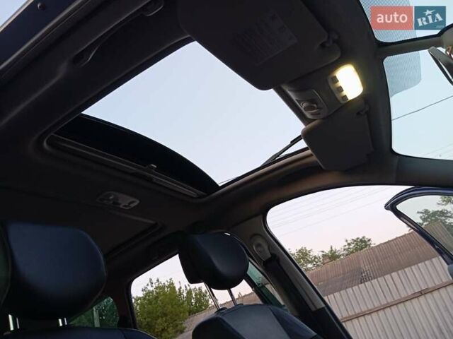 Синий Рено Megane Scenic, объемом двигателя 2 л и пробегом 295 тыс. км за 7699 $, фото 23 на Automoto.ua