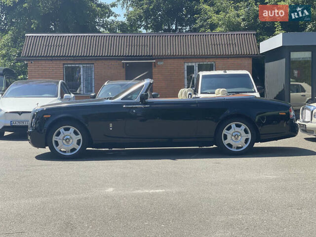 Черный Ролс Ройс Phantom Drophead Coupe, объемом двигателя 6.75 л и пробегом 124 тыс. км за 220000 $, фото 2 на Automoto.ua