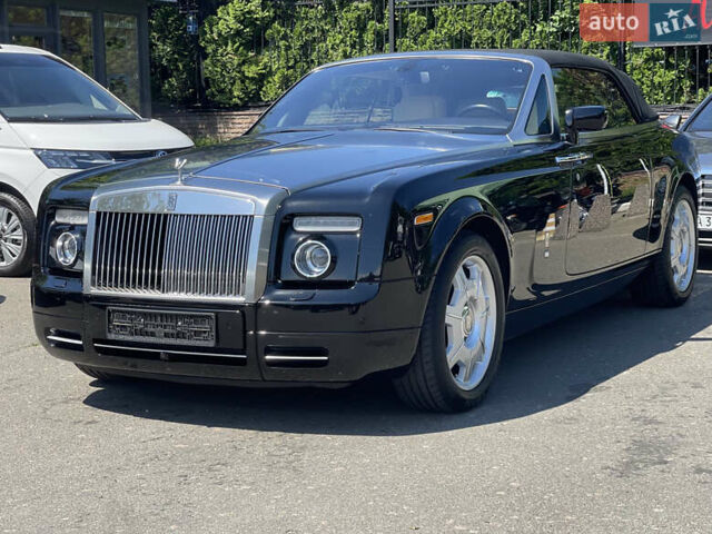 Черный Ролс Ройс Phantom Drophead Coupe, объемом двигателя 6.75 л и пробегом 124 тыс. км за 220000 $, фото 7 на Automoto.ua