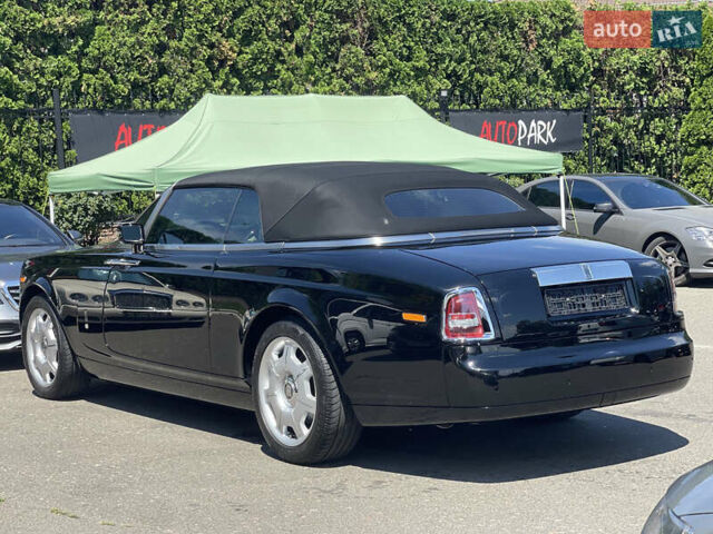 Черный Ролс Ройс Phantom Drophead Coupe, объемом двигателя 6.75 л и пробегом 124 тыс. км за 220000 $, фото 10 на Automoto.ua