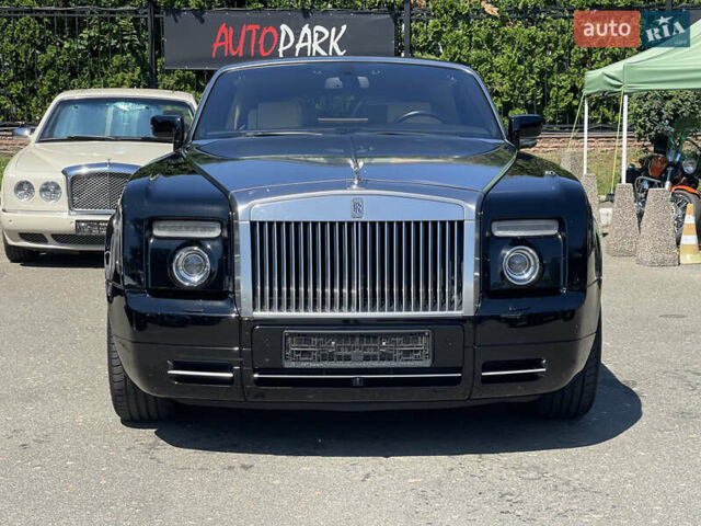 Черный Ролс Ройс Phantom Drophead Coupe, объемом двигателя 6.75 л и пробегом 124 тыс. км за 220000 $, фото 8 на Automoto.ua