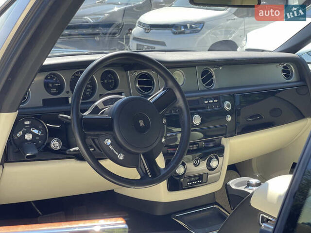 Черный Ролс Ройс Phantom Drophead Coupe, объемом двигателя 6.75 л и пробегом 124 тыс. км за 220000 $, фото 14 на Automoto.ua