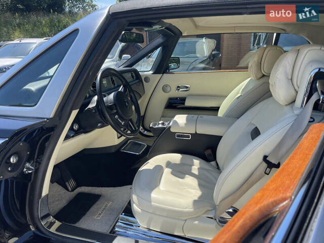 Черный Ролс Ройс Phantom Drophead Coupe, объемом двигателя 6.75 л и пробегом 124 тыс. км за 220000 $, фото 15 на Automoto.ua