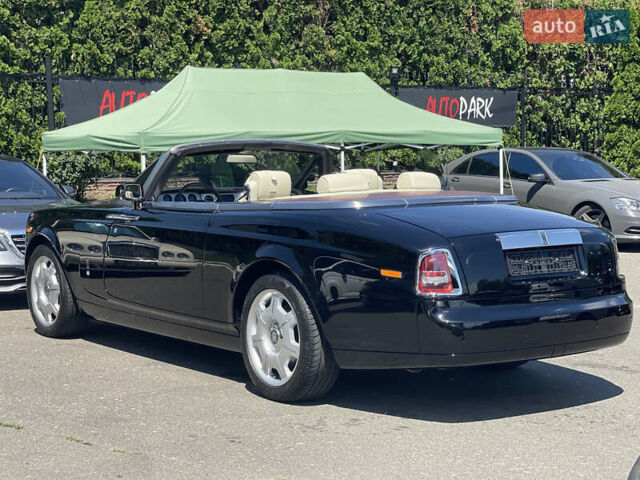 Черный Ролс Ройс Phantom Drophead Coupe, объемом двигателя 6.75 л и пробегом 124 тыс. км за 220000 $, фото 4 на Automoto.ua