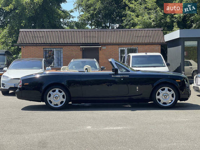 Черный Ролс Ройс Phantom Drophead Coupe, объемом двигателя 6.75 л и пробегом 124 тыс. км за 220000 $, фото 5 на Automoto.ua