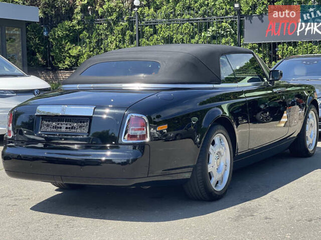 Черный Ролс Ройс Phantom Drophead Coupe, объемом двигателя 6.75 л и пробегом 124 тыс. км за 220000 $, фото 9 на Automoto.ua