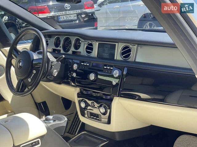 Черный Ролс Ройс Phantom Drophead Coupe, объемом двигателя 6.75 л и пробегом 124 тыс. км за 220000 $, фото 26 на Automoto.ua