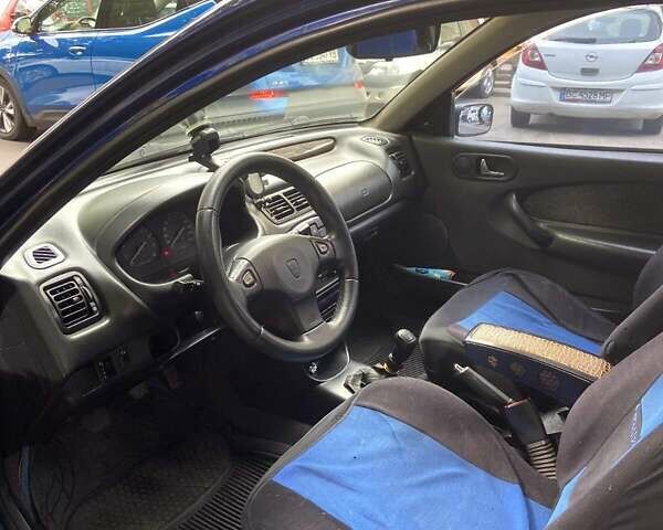 Синій Ровер 200, об'ємом двигуна 1.4 л та пробігом 185 тис. км за 2550 $, фото 7 на Automoto.ua