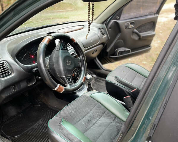 Ровер 200 1999 в Киеве на Automoto.ua Зеленый Ровер 200, объемом двигателя 1.4 л и пробегом 200 тыс. км за 1000 $, фото 5 на Automoto.ua