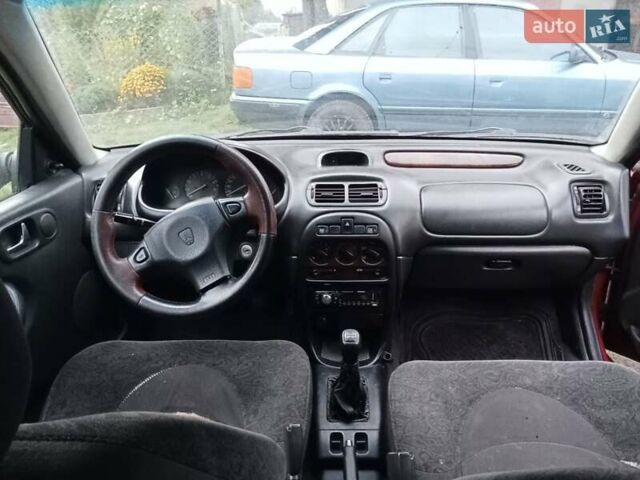 Червоний Ровер 214, об'ємом двигуна 1.4 л та пробігом 232 тис. км за 1650 $, фото 11 на Automoto.ua