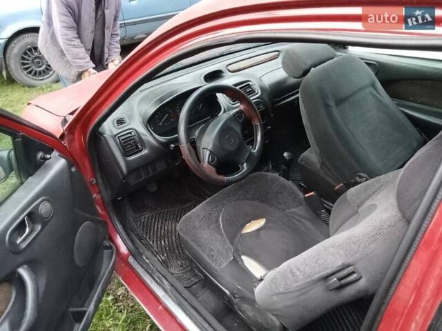 Червоний Ровер 214, об'ємом двигуна 1.4 л та пробігом 232 тис. км за 1650 $, фото 14 на Automoto.ua