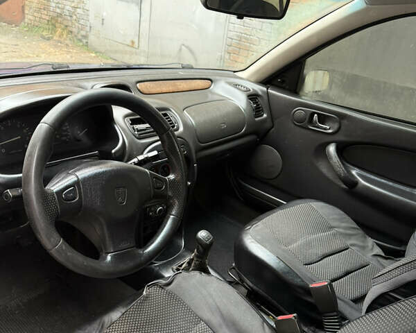 Синій Ровер 216, об'ємом двигуна 1.4 л та пробігом 250 тис. км за 1500 $, фото 10 на Automoto.ua