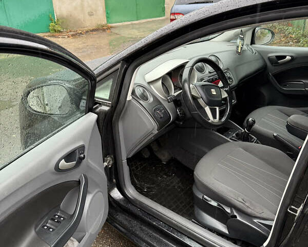 Черный Сеат Ибица, объемом двигателя 1.2 л и пробегом 200 тыс. км за 4999 $, фото 12 на Automoto.ua