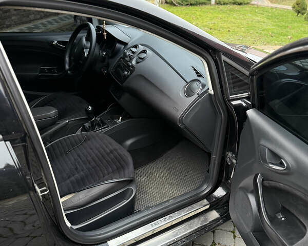 Черный Сеат Ибица, объемом двигателя 1.2 л и пробегом 230 тыс. км за 4950 $, фото 5 на Automoto.ua
