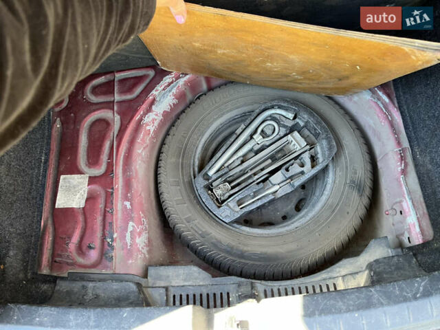 Червоний Сеат Ibiza, об'ємом двигуна 1.39 л та пробігом 222 тис. км за 4500 $, фото 12 на Automoto.ua