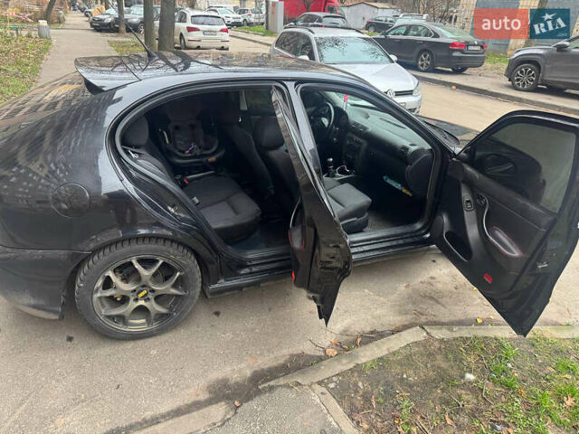 Чорний Сеат Leon, об'ємом двигуна 1.8 л та пробігом 300 тис. км за 5500 $, фото 5 на Automoto.ua