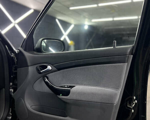Сааб 9-3 2005 в Киеве на Automoto.ua Черный Сааб 9-3, объемом двигателя 1.8 л и пробегом 267 тыс. км за 4990 $, фото 35 на Automoto.ua