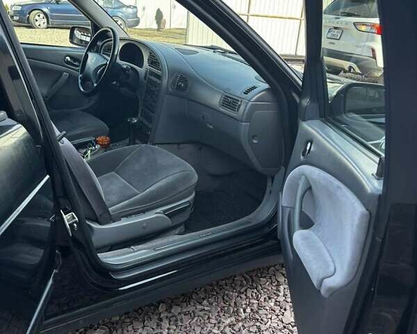 Чорний Сааб 9-5, об'ємом двигуна 2 л та пробігом 406 тис. км за 2300 $, фото 4 на Automoto.ua