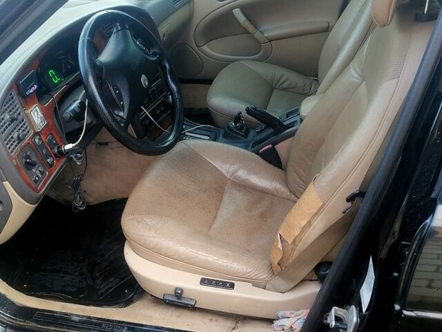 Черный Сааб 9-5, объемом двигателя 2.3 л и пробегом 297 тыс. км за 2200 $, фото 2 на Automoto.ua