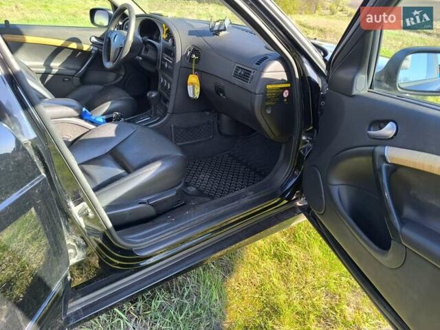 Черный Сааб 9-5, объемом двигателя 2 л и пробегом 255 тыс. км за 4444 $, фото 3 на Automoto.ua