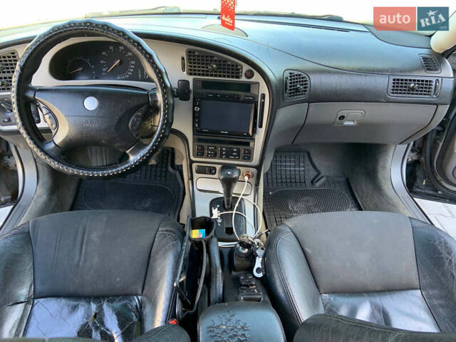 Сірий Сааб 9-5, об'ємом двигуна 2.29 л та пробігом 376 тис. км за 3950 $, фото 9 на Automoto.ua