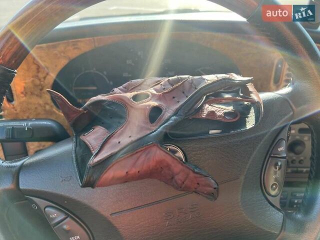 Серый Сааб 9-5, объемом двигателя 2.29 л и пробегом 331 тыс. км за 7500 $, фото 1 на Automoto.ua