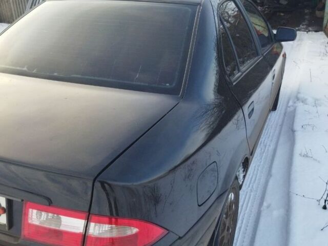 Чорний Саманд LX, об'ємом двигуна 1.8 л та пробігом 311 тис. км за 2000 $, фото 1 на Automoto.ua